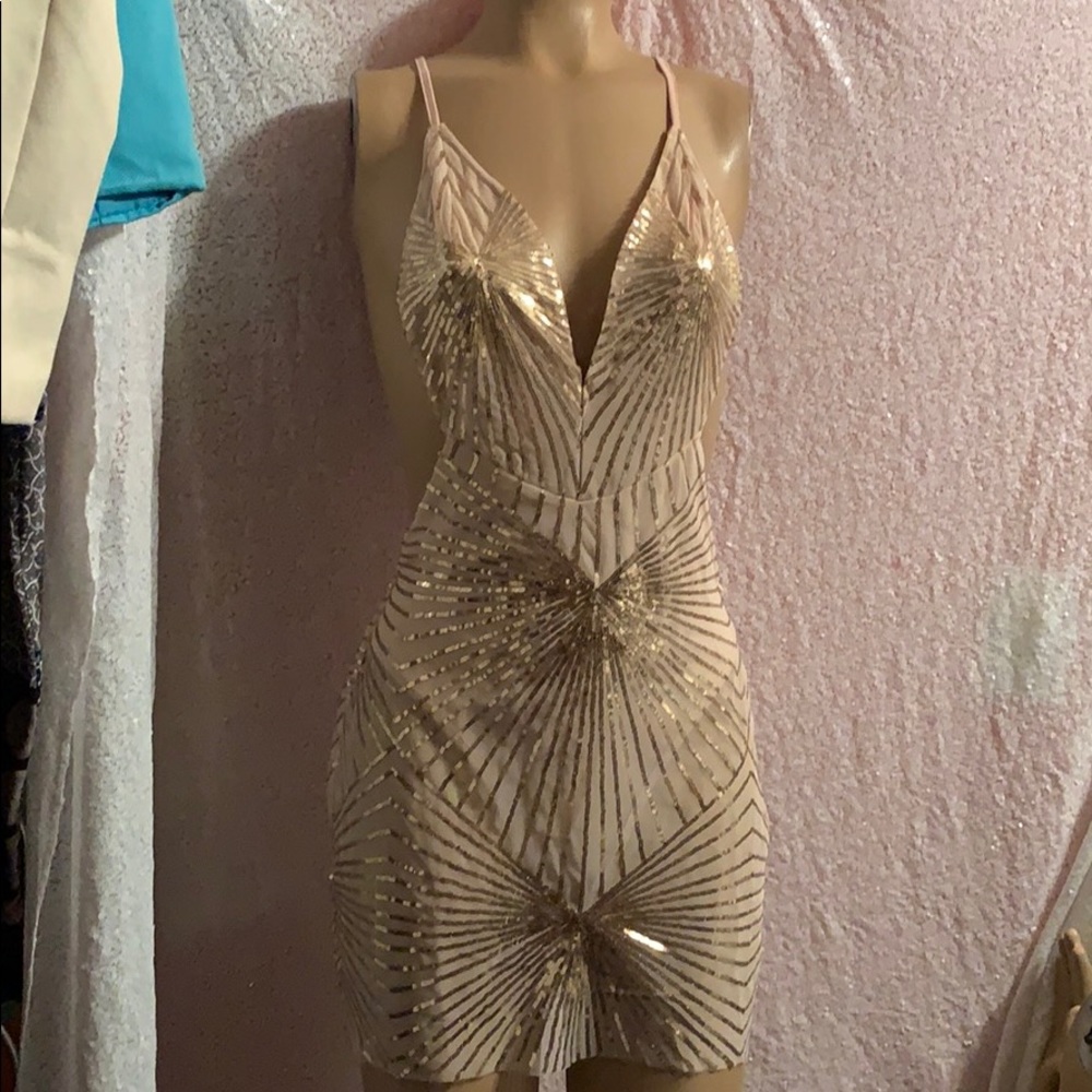 Wow what a dress size small this dress is gold